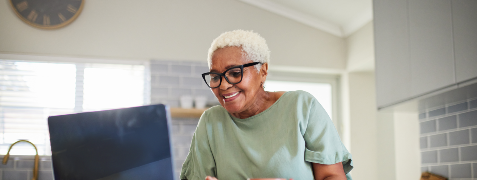 Woman on her laptop having a discussion.