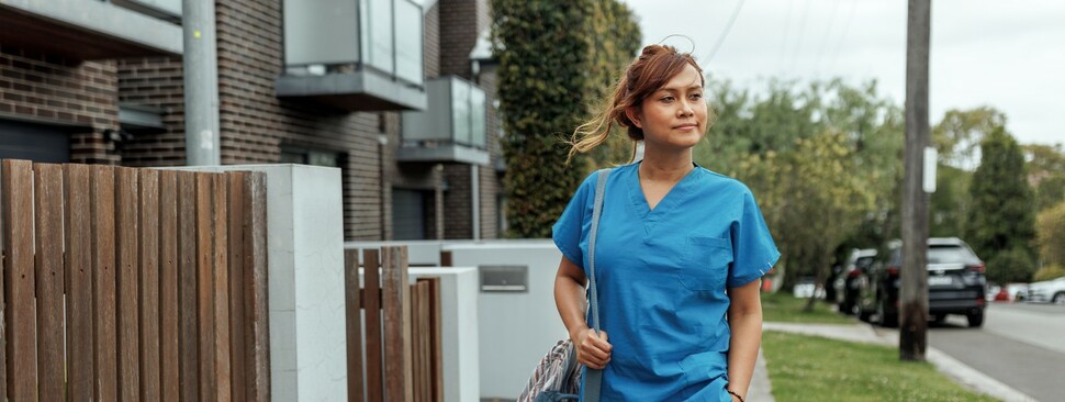 Young nurse walking home