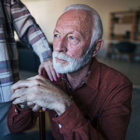elderly man in deep thought