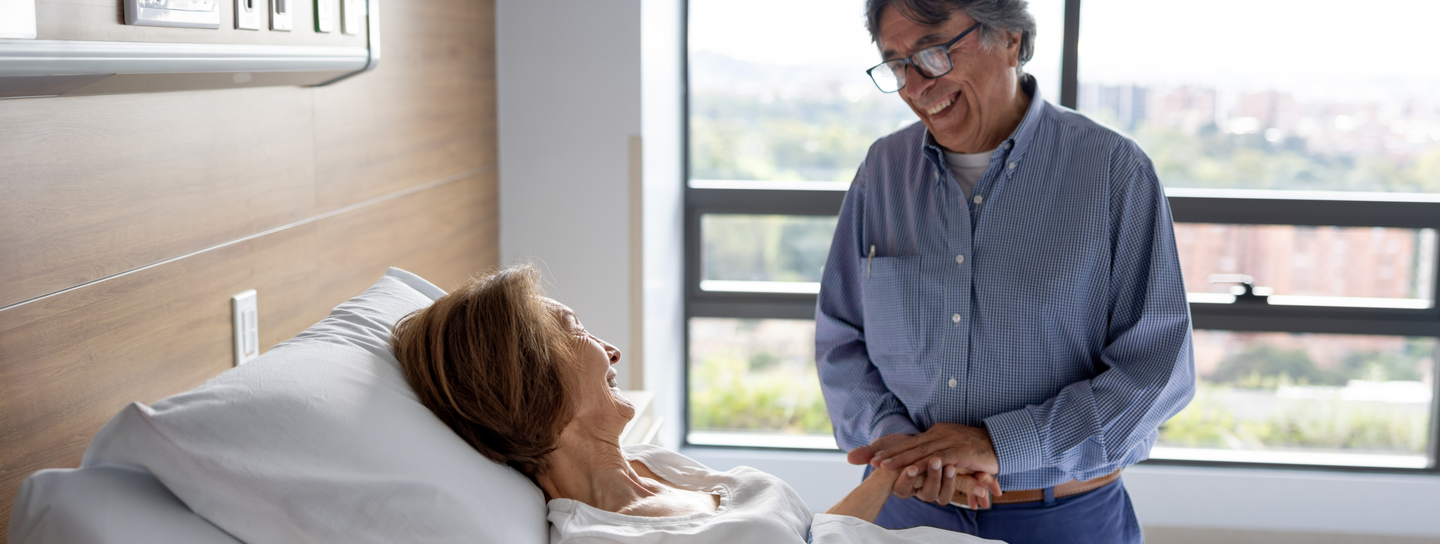 Woman with eyes closed sitting in a church.