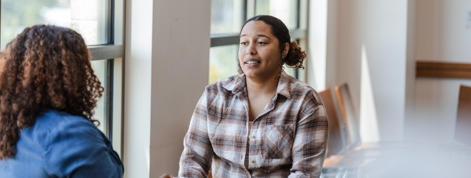 Woman talking with a counselor.