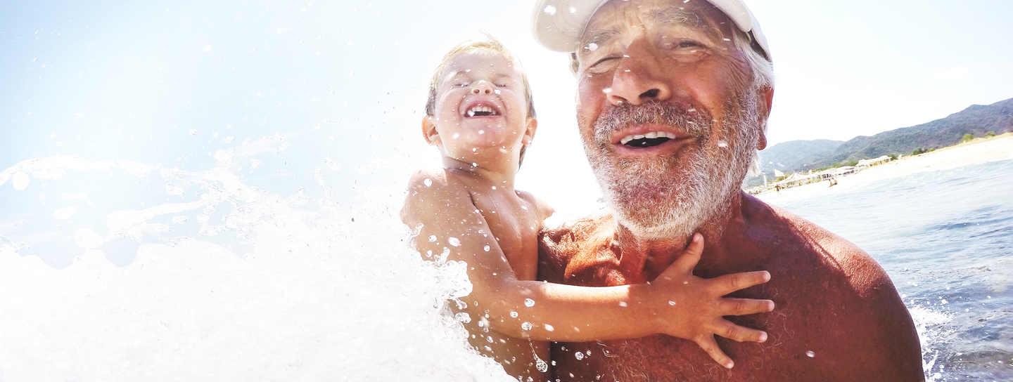 A man holds his grandchild
