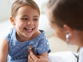 Girl smiling at her check-up
