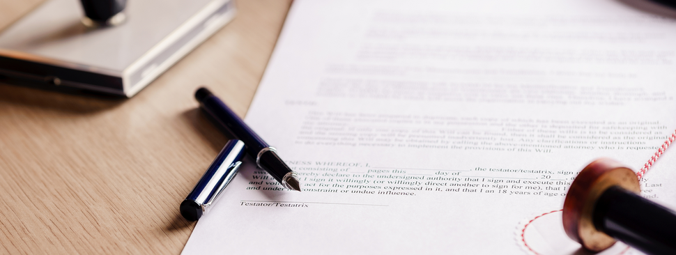 Paper, pen, and a ink stamp.