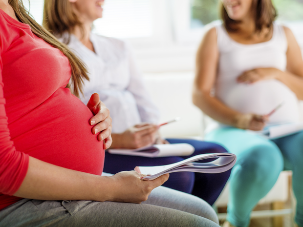 Pregnant women in a class