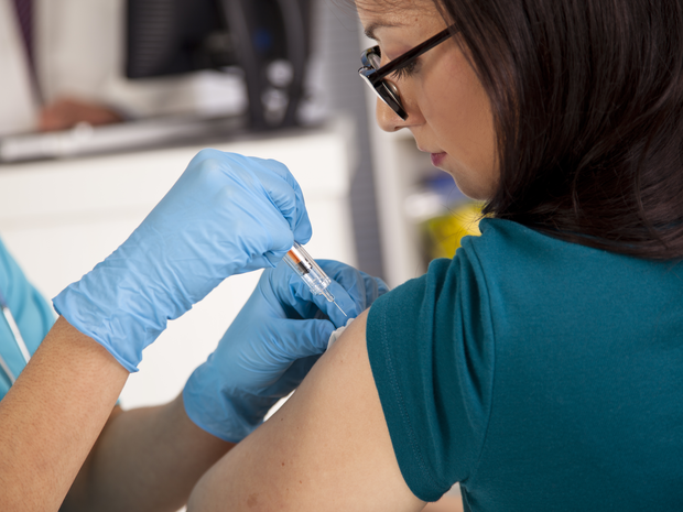 Patient receives and injection.