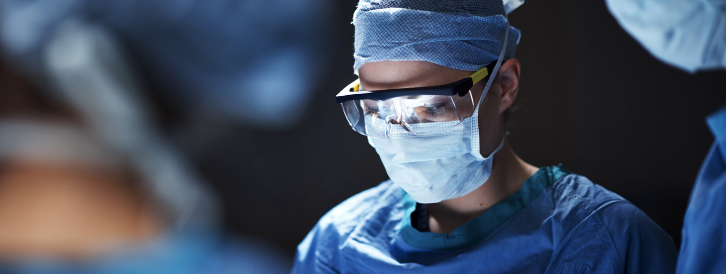 A surgeon dressed for surgery