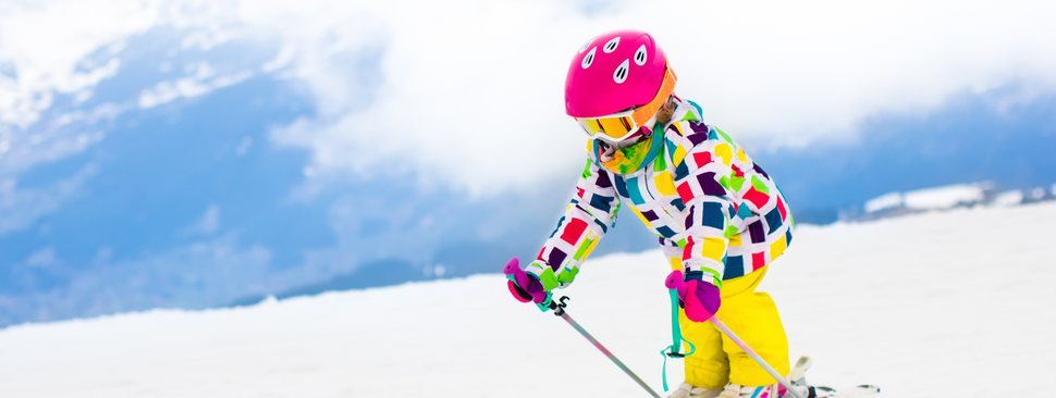 Child skiing in the mountains