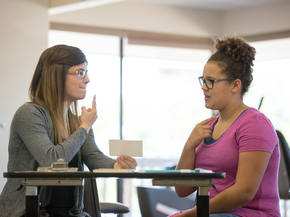 Young woman with a speech therapist