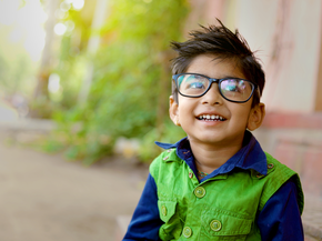 young boy with glasses
