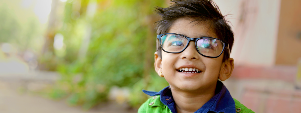 young boy with glasses