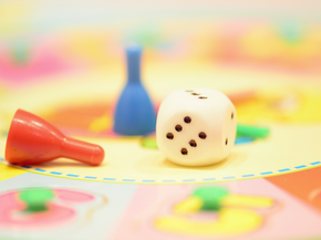 Board game multicolor pieces. 