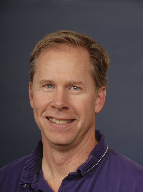  Professional headshot of a man