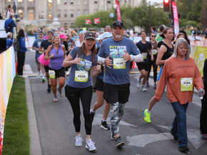 Man and woman running the FitOne 10K