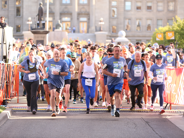 Runners starting the FitOne 5K race.