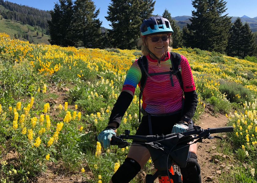 Older woman on a mountain bike