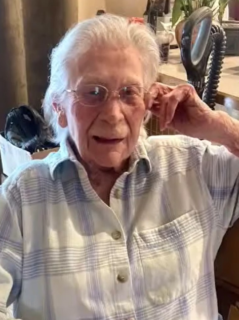  Woman sitting in a chair