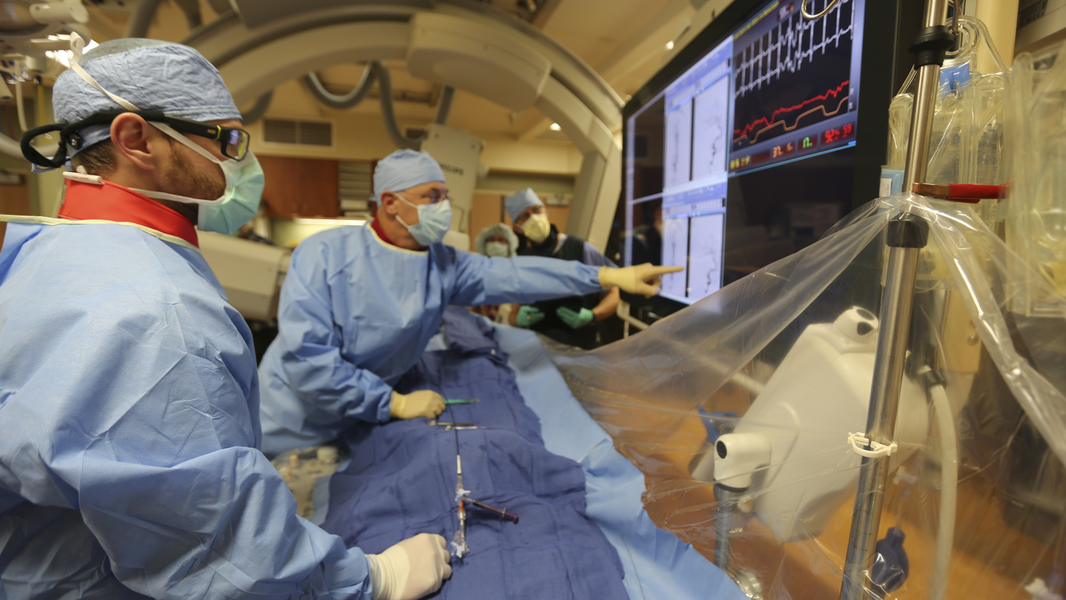 Provider points to large screen with other providers