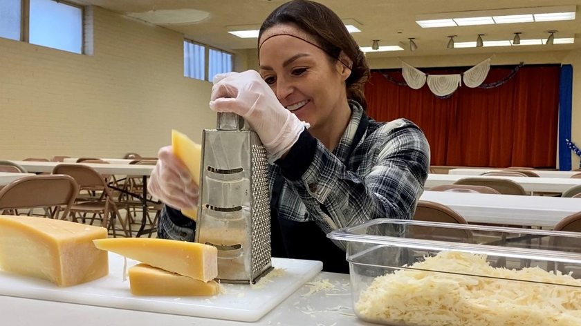 Woman shredding cheese
