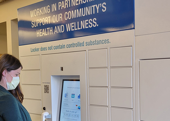 Person standing in front of medication locker