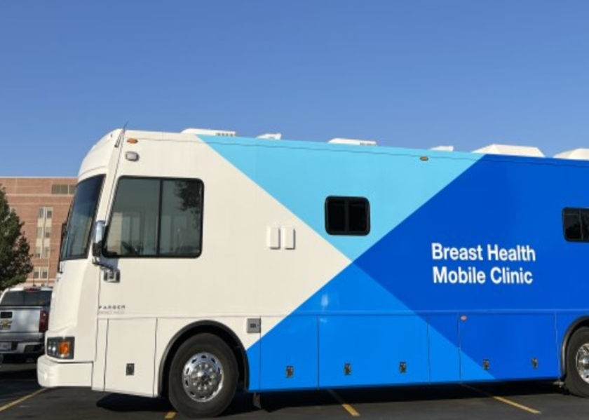 St. Luke’s mobile breast health clinic parked in a gravel parking lot. 