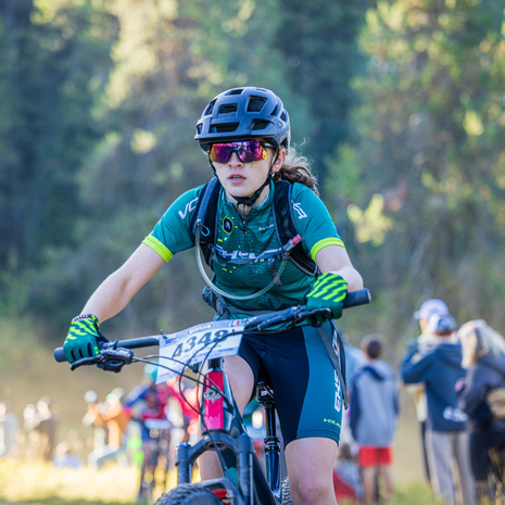 teenage girl mountain biking
