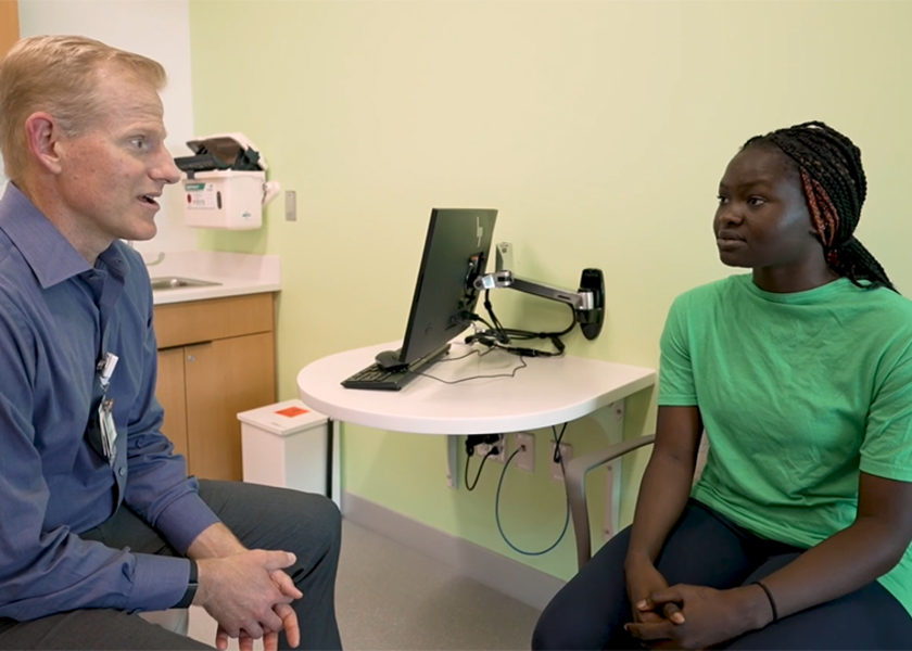 Dr. Nilsson and student having a discussion.