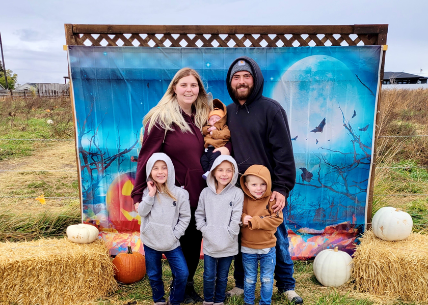  Family gathered at Halloween event.