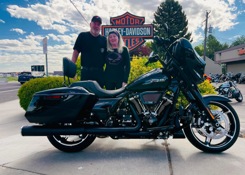 Peggy and Jeff on a motorcycle