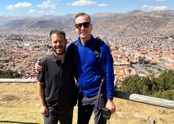 Doctor's standing together at outlook over Cusco, Peru.