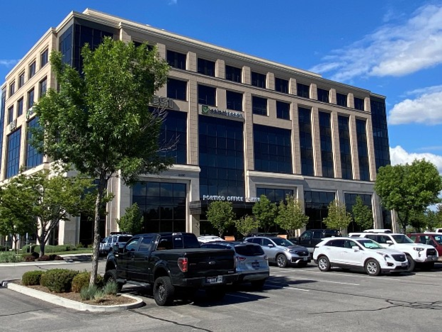 Exterior view of the Portico North building where the Patient Financial Services office is located.