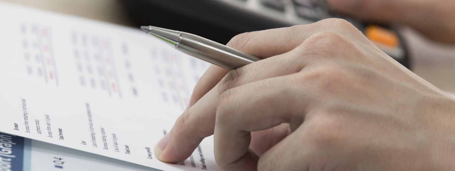 Couple speaking with tax advisor