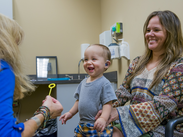 Mother and Baby with Hearing and Balance specialist.