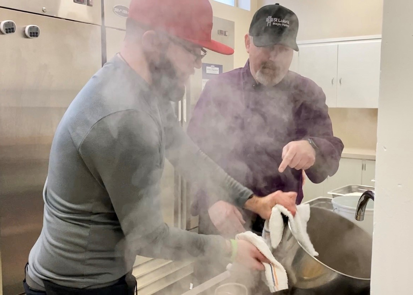 Two men cooking