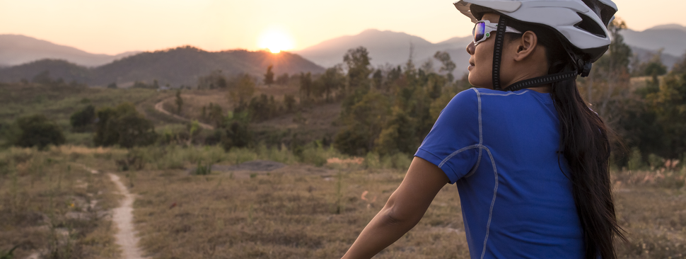 Woman rides her bike