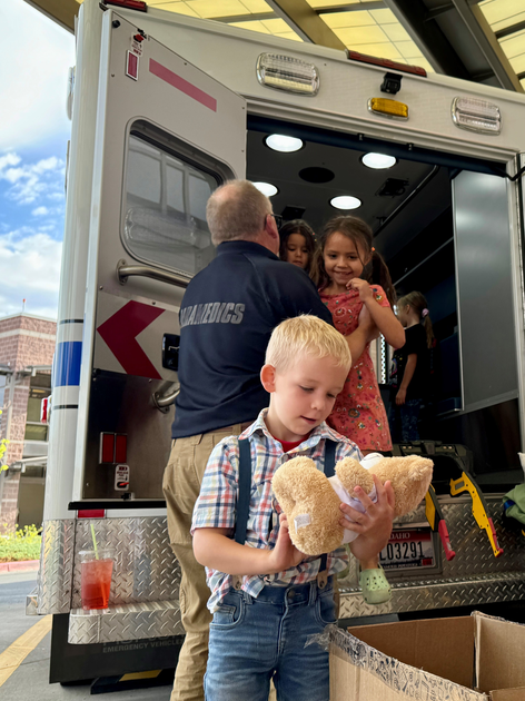  A child holding his bear