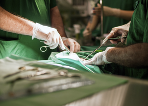 Doctors perform surgery