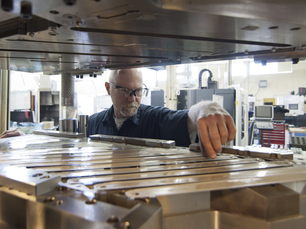 Worker with safety glasses on