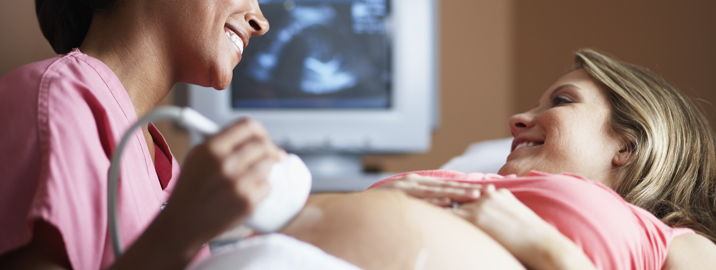 A pregnant woman getting an ultrasound