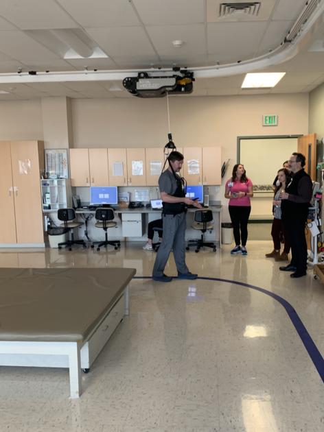 Man secured in medical suspension device