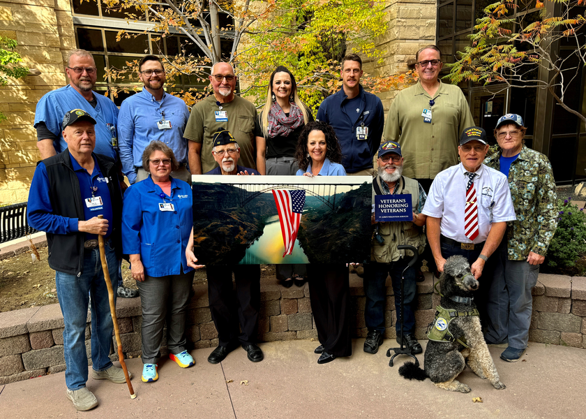 Vets and St. Luke's employees pose at the program launch celebration.