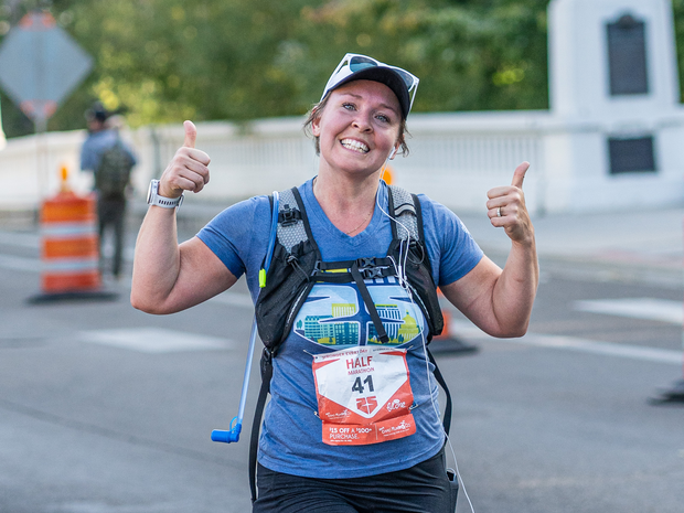 Man and woman running the half marathon