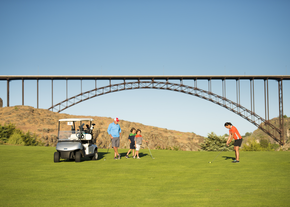 Family golfs at fundraiser.