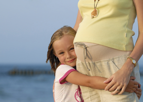 Mother and daughter embrace