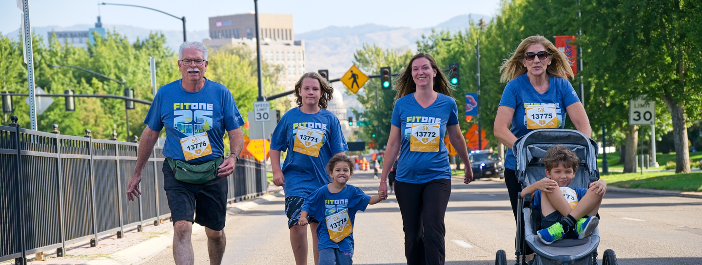 Dad racing FitOne 5K with daughter