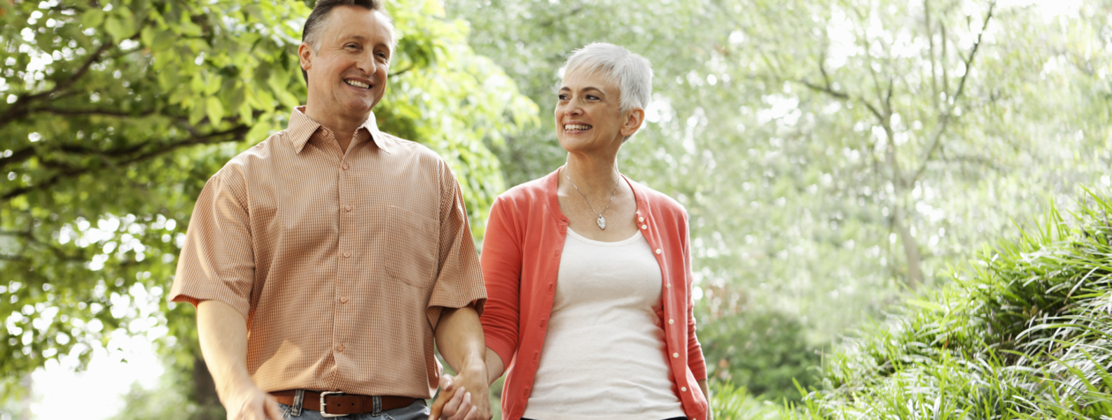 A couple walking together smiling
