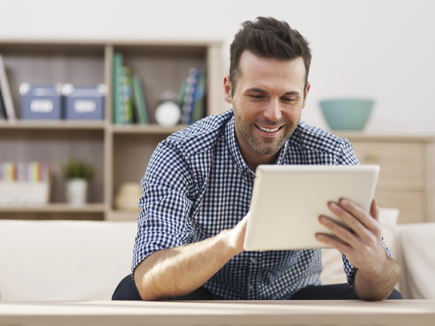 Man works on tablet