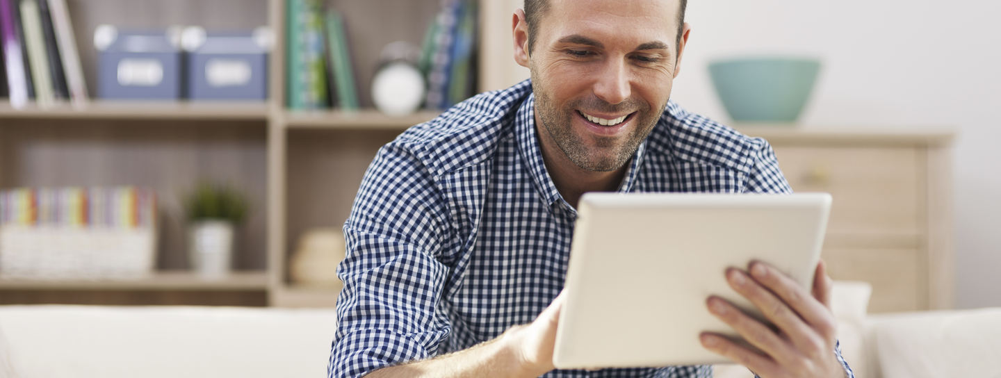 Man working on tablet computer