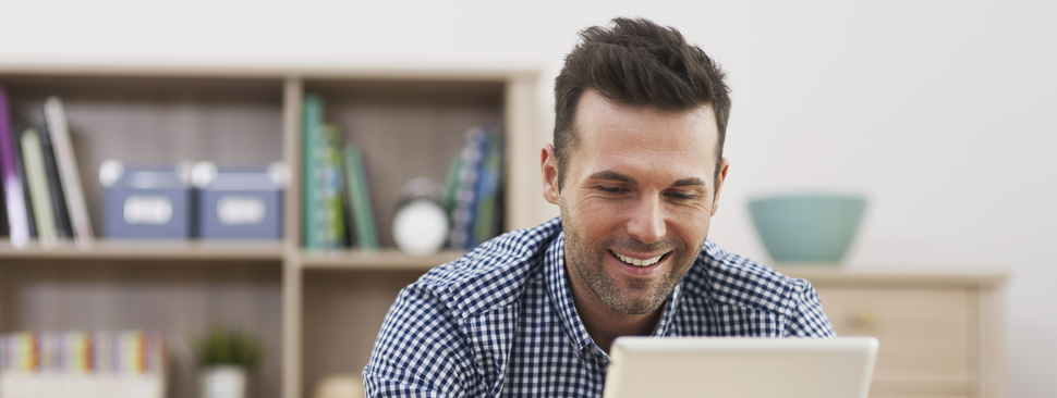 Man working on tablet computer
