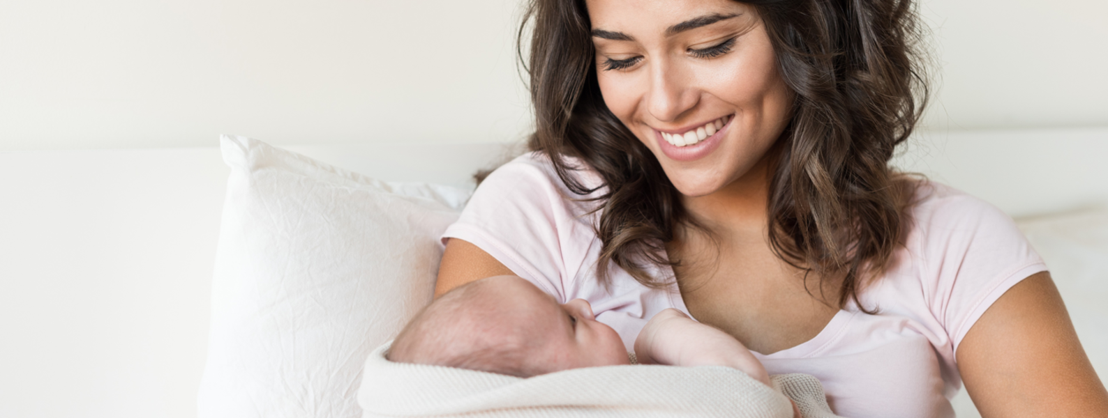Mother holding her infant.